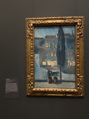 A painting in an ornate frame in a museum.